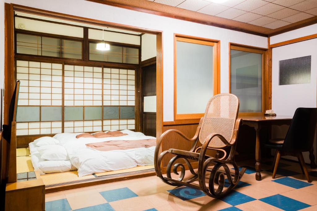 Postel nebo postele na pokoji v ubytování Guest House Kura