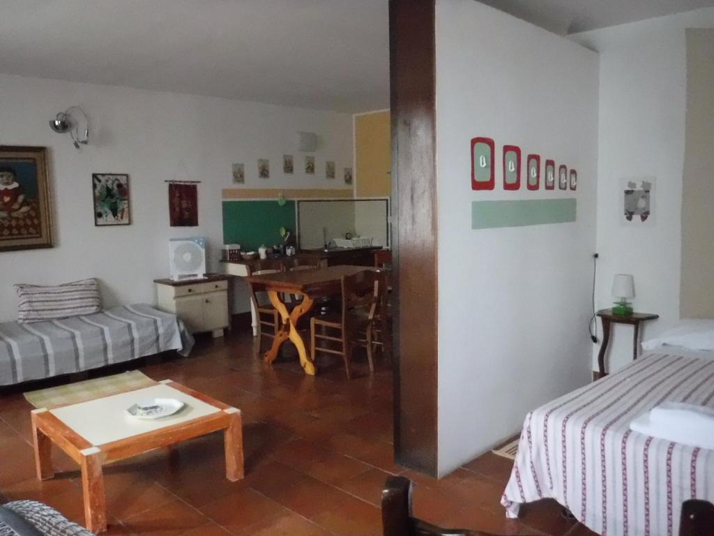 Postel nebo postele na pokoji v ubytování Stasion Di Pueste