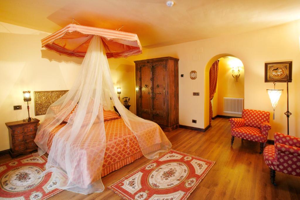 Posteľ alebo postele v izbe v ubytovaní Hotel Boutique Real Casona De Las Amas