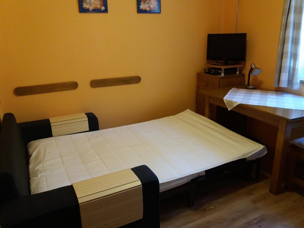 Postel nebo postele na pokoji v ubytování Pension Rieger