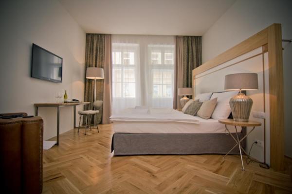 Voodi või voodid majutusasutuse Jungmann Hotel toas