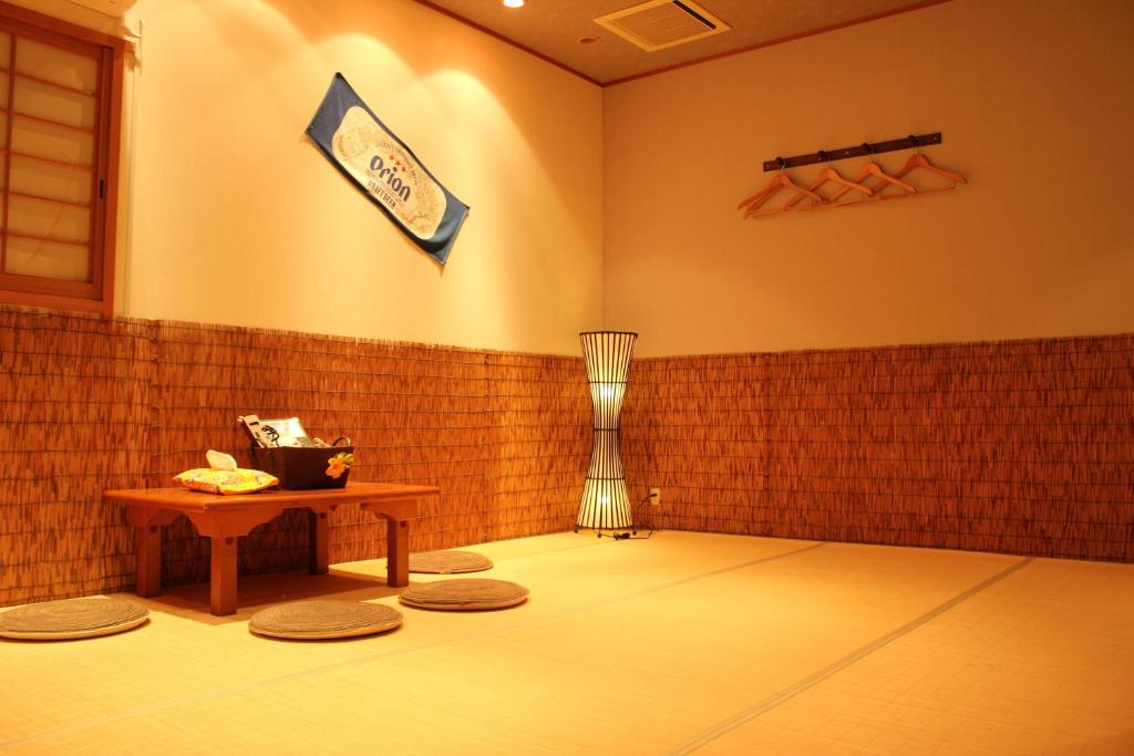 Fotografie z fotogalerie ubytování Okinawa Minshuku Kariyushi v destinaci Širahama