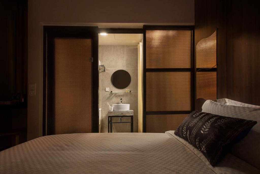 Postel nebo postele na pokoji v ubytování Hotel Twenty 8B