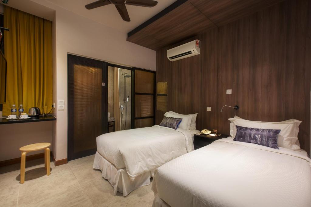 Postel nebo postele na pokoji v ubytování Hotel Twenty 8B