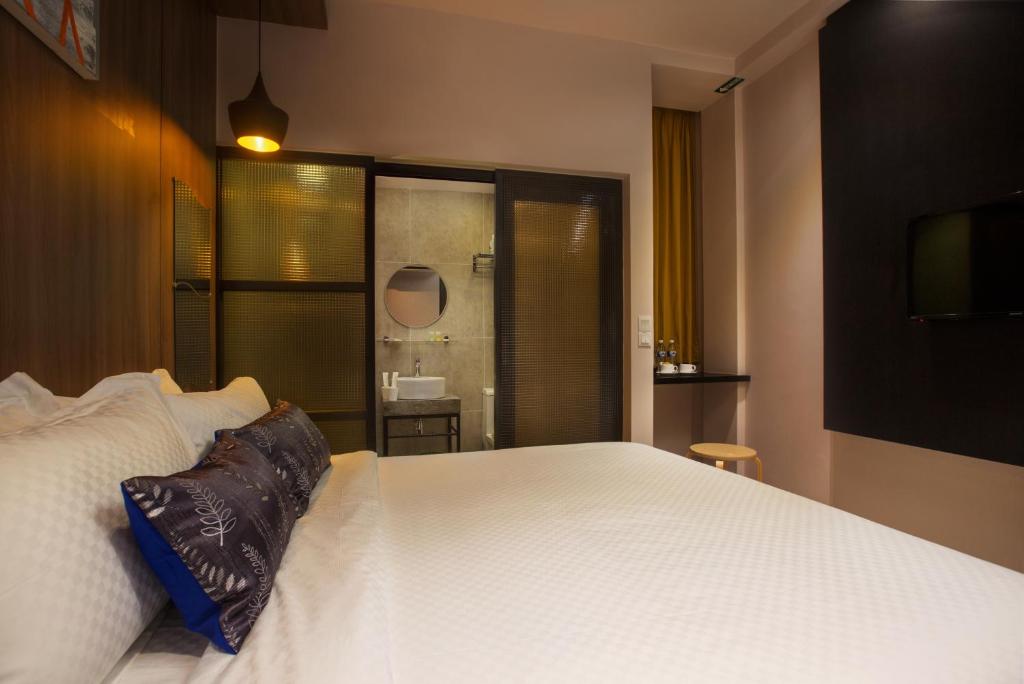 Postel nebo postele na pokoji v ubytování Hotel Twenty 8B