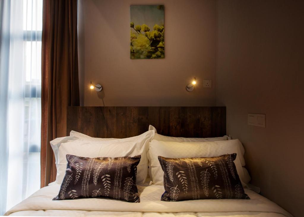 Postel nebo postele na pokoji v ubytování Hotel Twenty 8B
