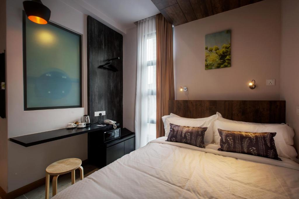 Postel nebo postele na pokoji v ubytování Hotel Twenty 8B