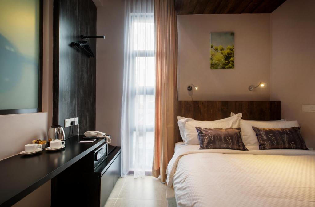 Postel nebo postele na pokoji v ubytování Hotel Twenty 8B