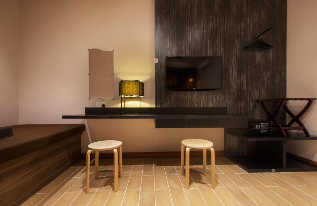 TV a/nebo společenská místnost v ubytování Hotel Twenty 8B