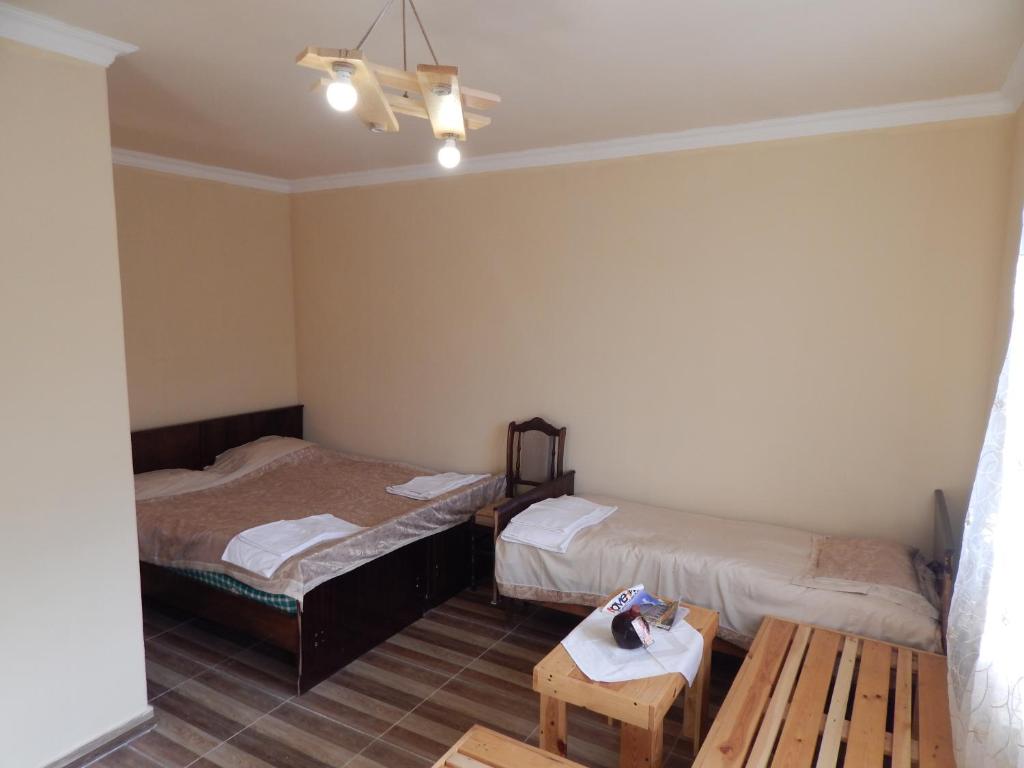 Postel nebo postele na pokoji v ubytování Arami Guest House