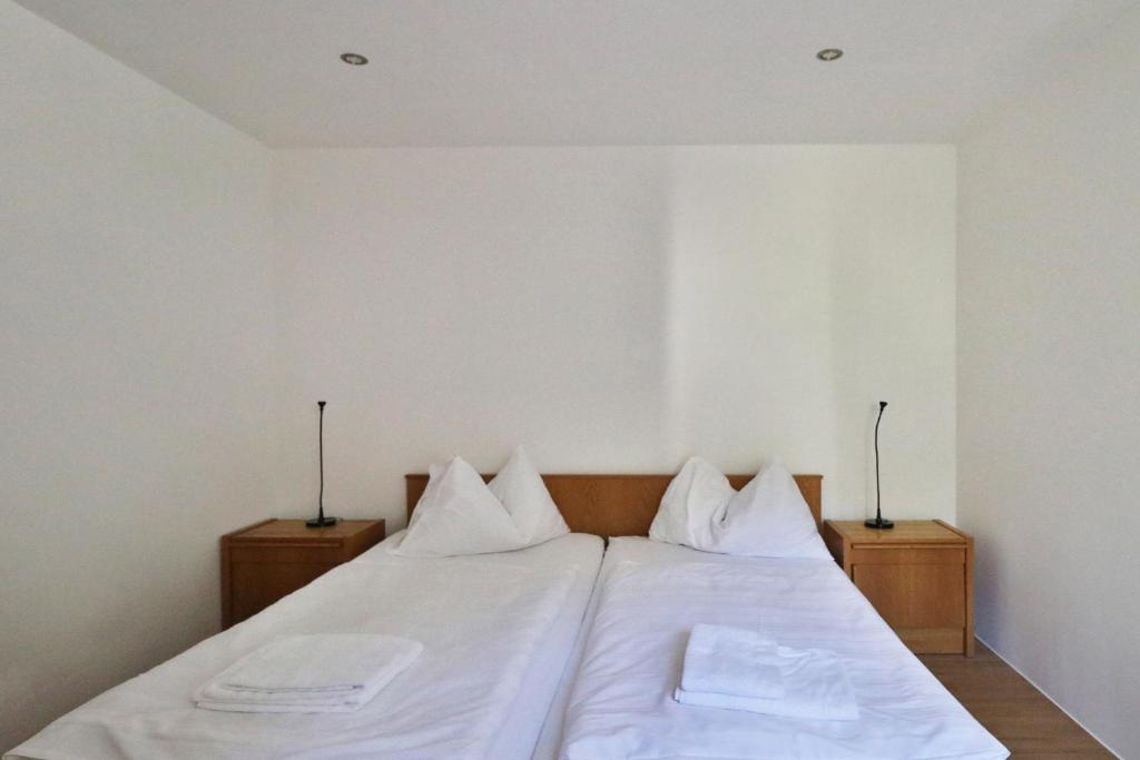A bed or beds in a room at Appartements Christophorus