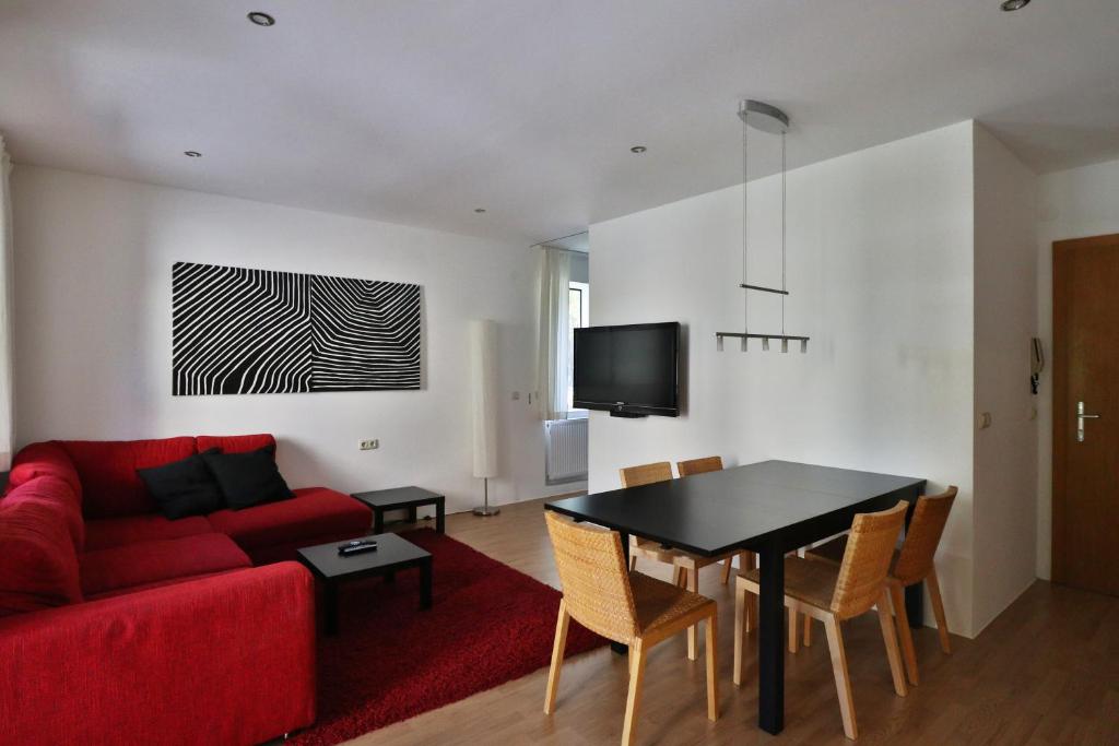 A television and/or entertainment centre at Appartements Christophorus