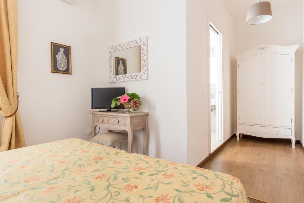 Postel nebo postele na pokoji v ubytování B&B La Bragadina