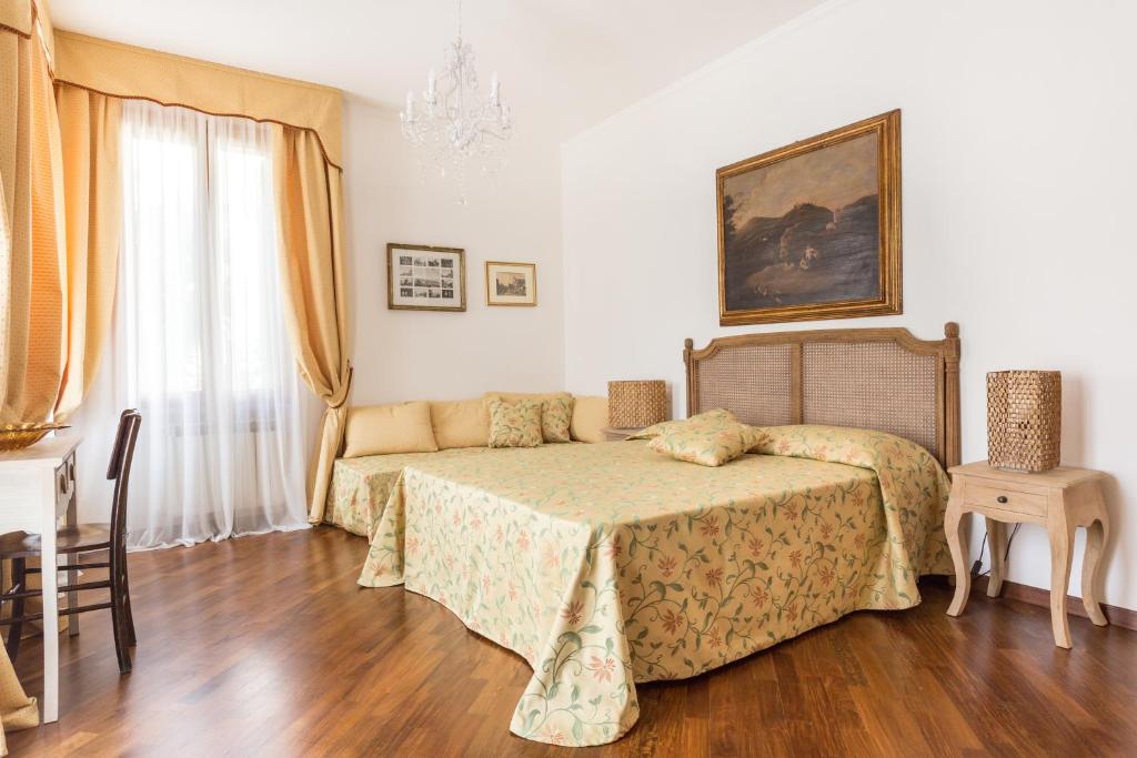 Postel nebo postele na pokoji v ubytování B&B La Bragadina