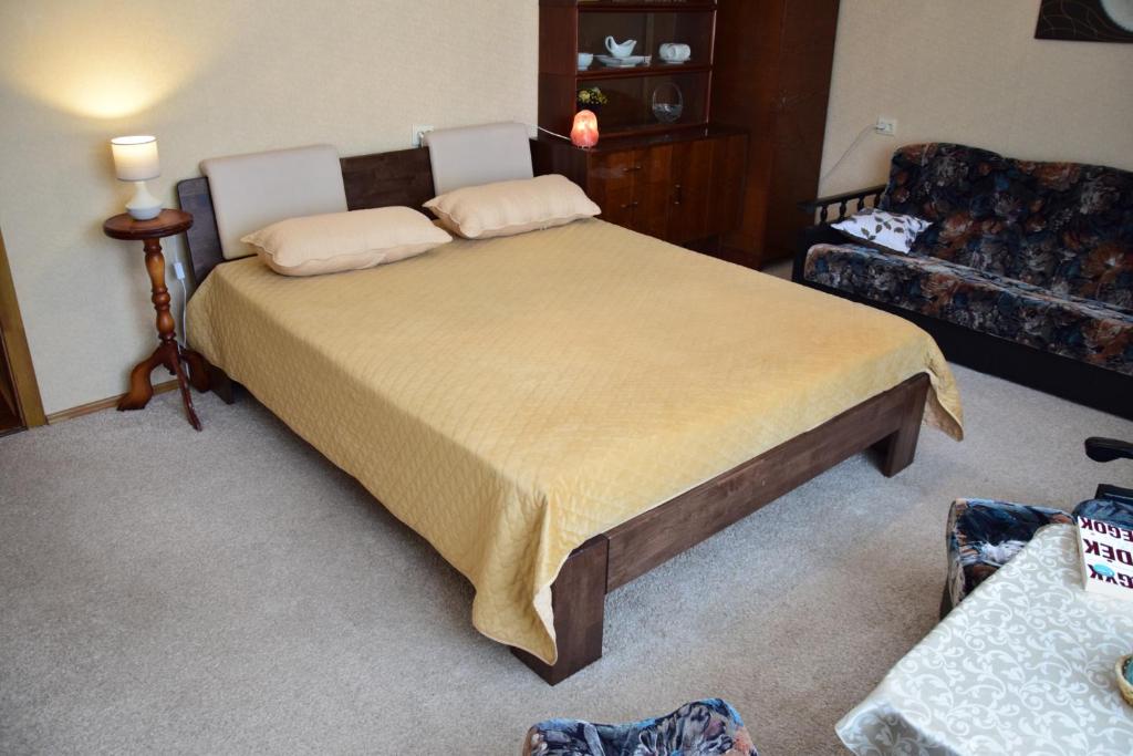 Postel nebo postele na pokoji v ubytování Čiurlionio 83 Druskininkai