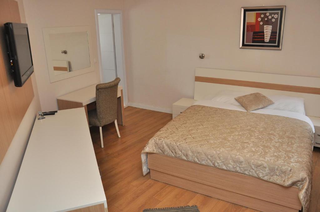 Postel nebo postele na pokoji v ubytování Hotel Prima