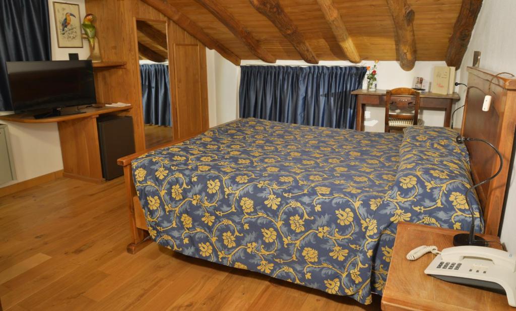 Postel nebo postele na pokoji v ubytování La Brace