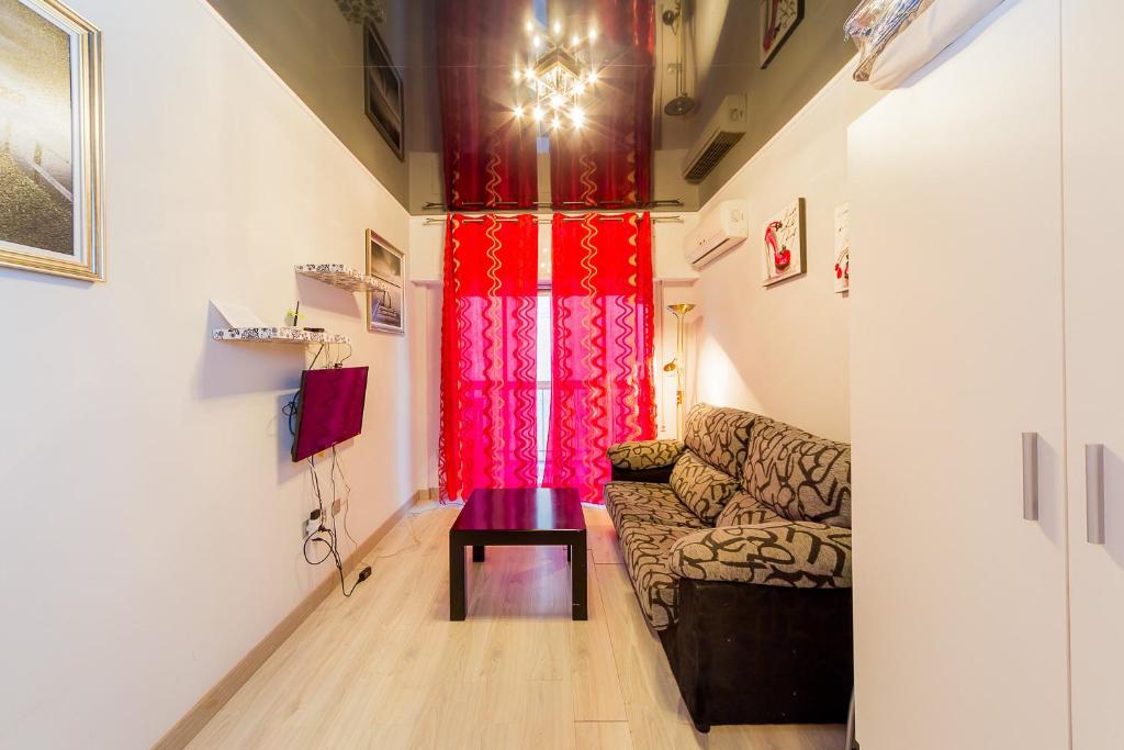 A television and/or entertainment centre at ALEGRIA ID33