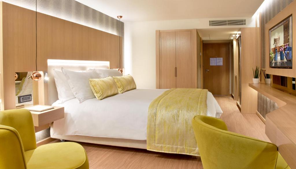 Postel nebo postele na pokoji v ubytování Maestral Resort & Casino