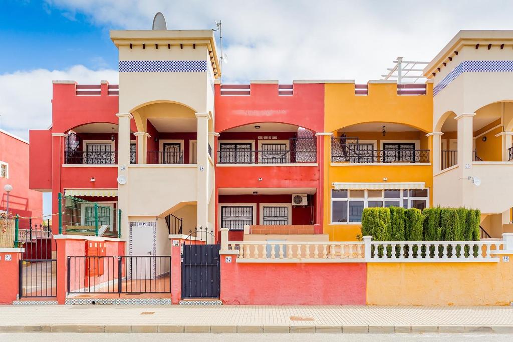 a colorful apartment building in san francisco at ALEGRIA ID51 in Orihuela Costa