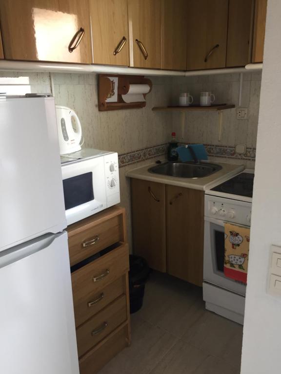 Kuchyňa alebo kuchynka v ubytovaní Studio Aparthotel PYR