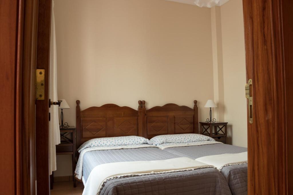 Posteľ alebo postele v izbe v ubytovaní Casa Rural Doña Margarita