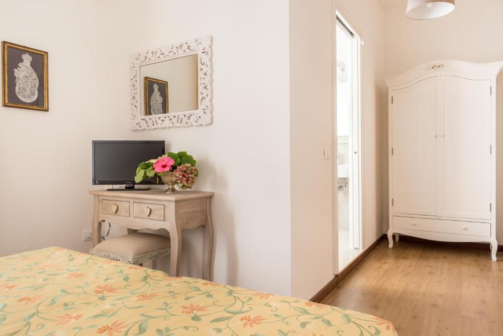 Postel nebo postele na pokoji v ubytování B&B La Bragadina