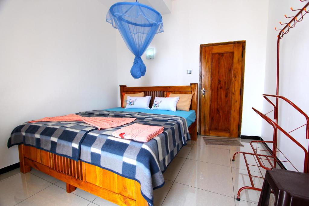 Postel nebo postele na pokoji v ubytování Sa Rest Inn
