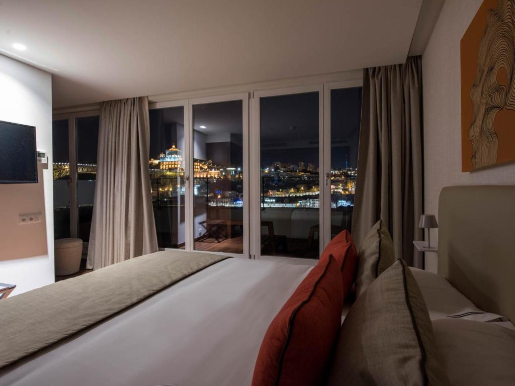 Postel nebo postele na pokoji v ubytování Hotel Carris Porto Ribeira