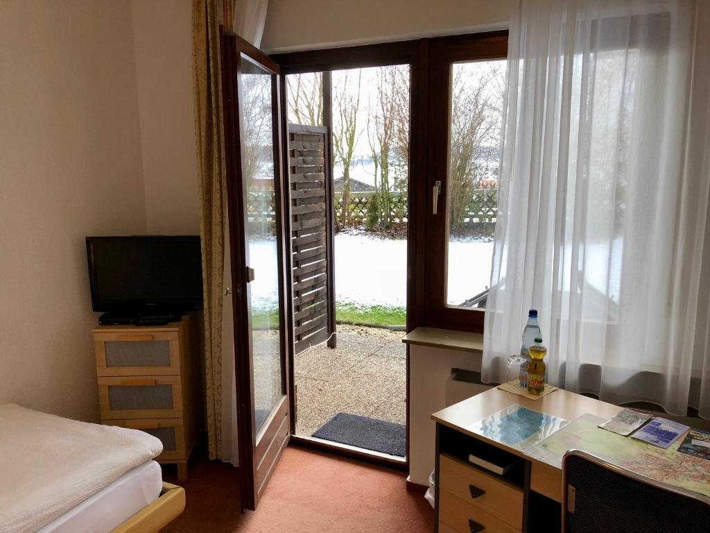 TV a/nebo společenská místnost v ubytování Hotel Del Sol