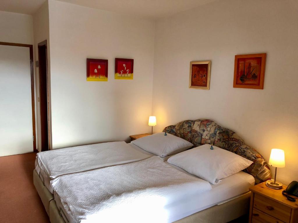 Postel nebo postele na pokoji v ubytování Hotel Del Sol