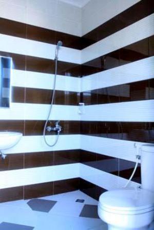 Un baño de Daily Home