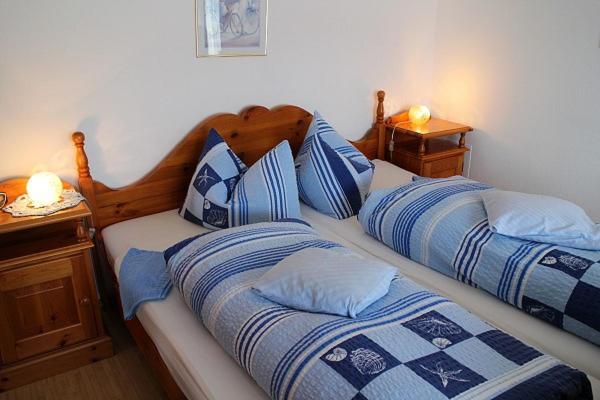 Postel nebo postele na pokoji v ubytování Hotel-Pension Thomé