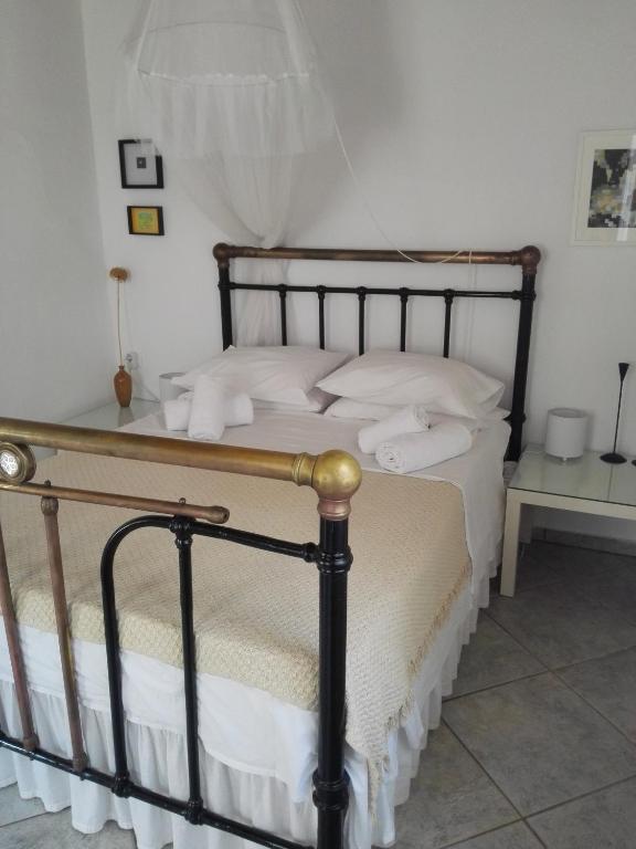 Posteľ alebo postele v izbe v ubytovaní Trouli House