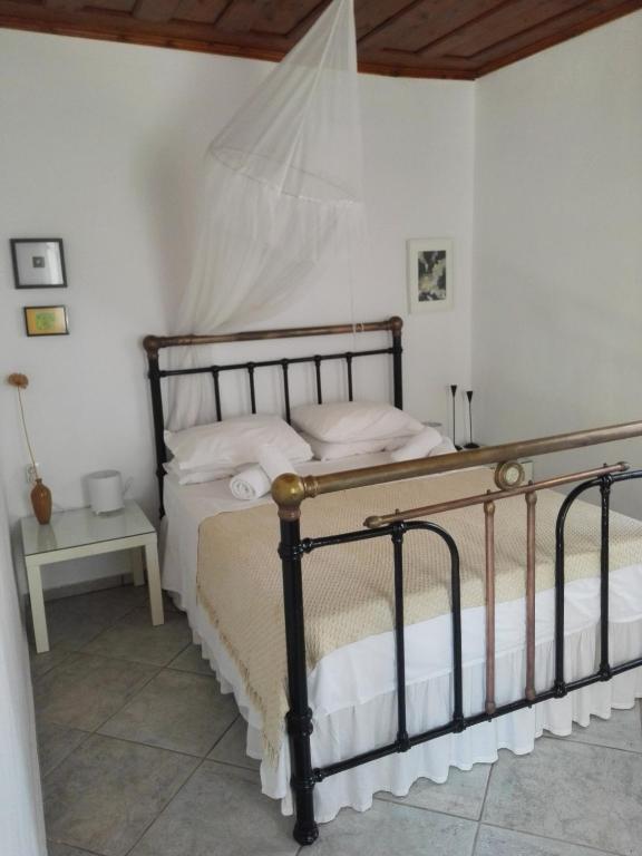 Posteľ alebo postele v izbe v ubytovaní Trouli House