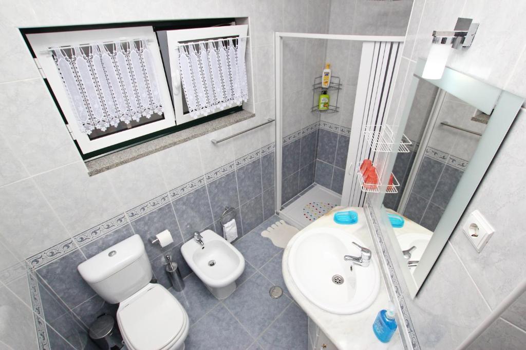 Koupelna v ubytování Guest House Pereira