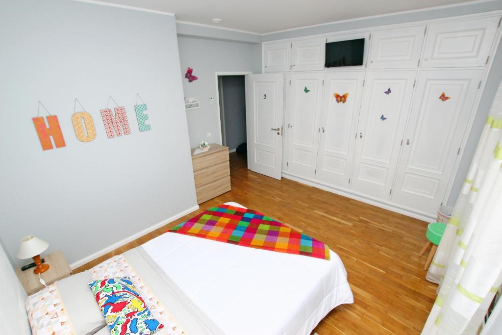 Postel nebo postele na pokoji v ubytování Guest House Pereira