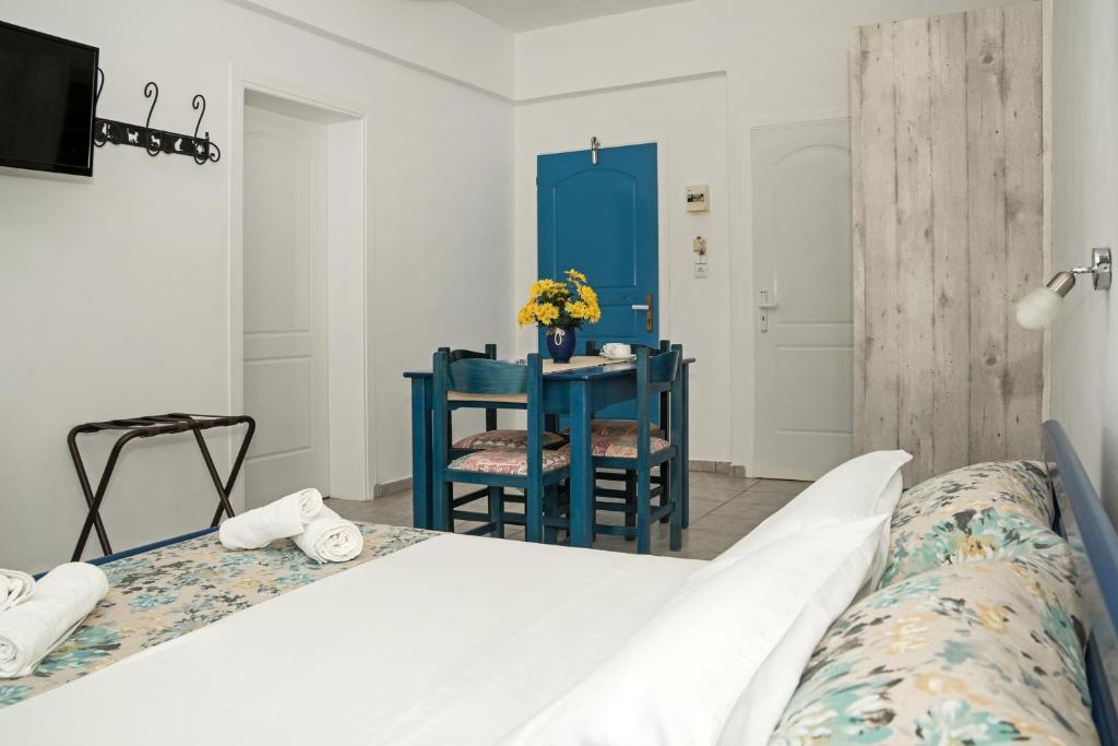 Postel nebo postele na pokoji v ubytování Maistrali Apartments