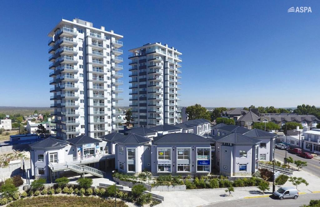 an aerial view of a apartment complex with two tall buildings at Mareas del Golfo in Las Grutas