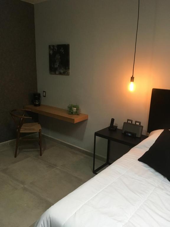 Postel nebo postele na pokoji v ubytování Casa Calila