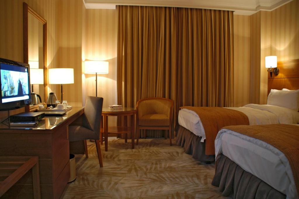 TV a/nebo společenská místnost v ubytování Sadeen Amman Hotel