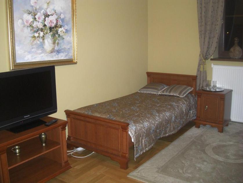 Postel nebo postele na pokoji v ubytování Dom Bankietowy Arkadia