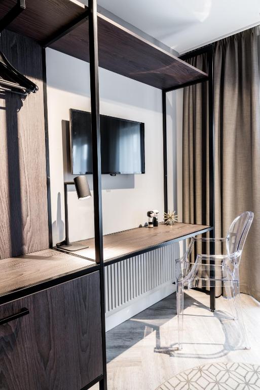 TV a/nebo společenská místnost v ubytování Sandton Eindhoven Centre