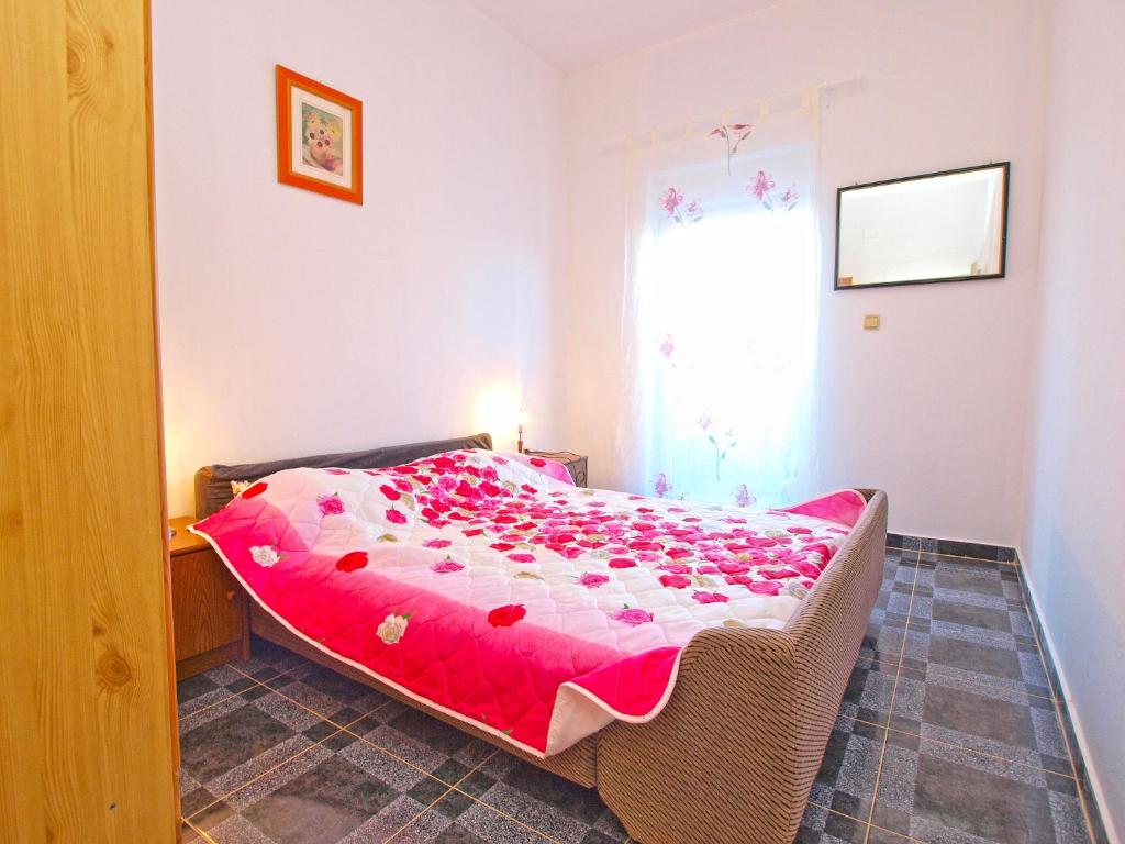Łóżko lub łóżka w pokoju w obiekcie Apartments Ivo 1328