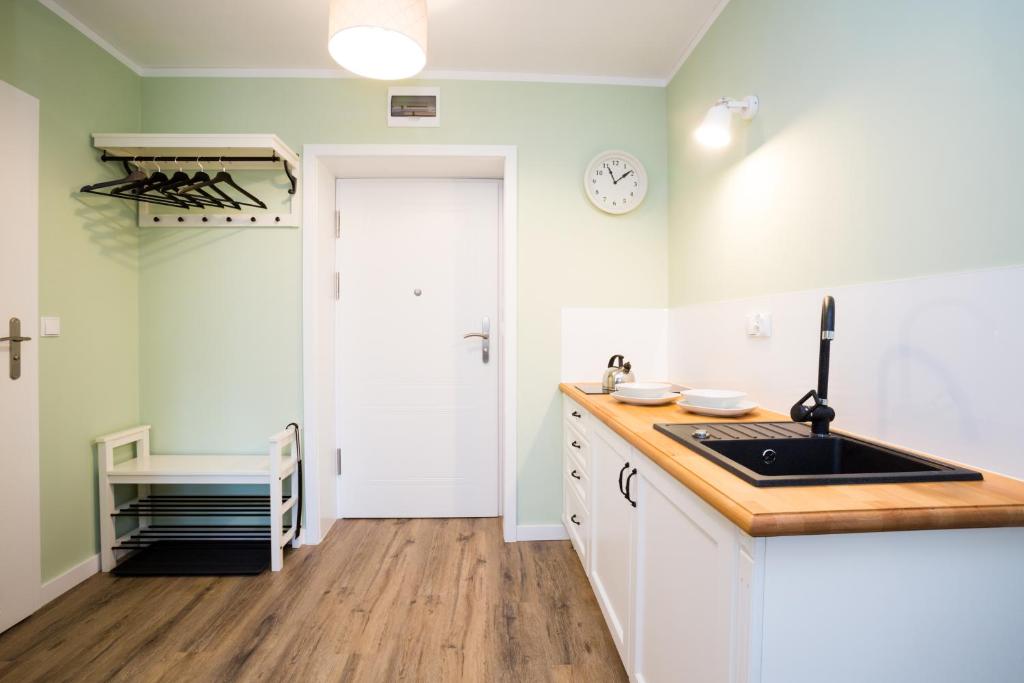 Kuchyňa alebo kuchynka v ubytovaní Apartamenty Bystra