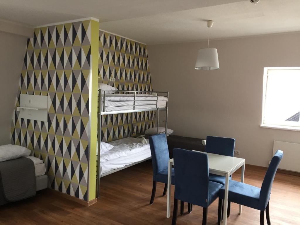 Postel nebo postele na pokoji v ubytování Hostel Marmota