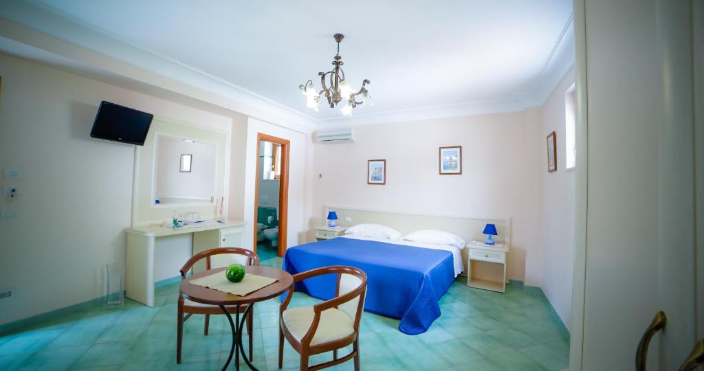 En eller flere senger på et rom på Casa Vacanze Vittoria
