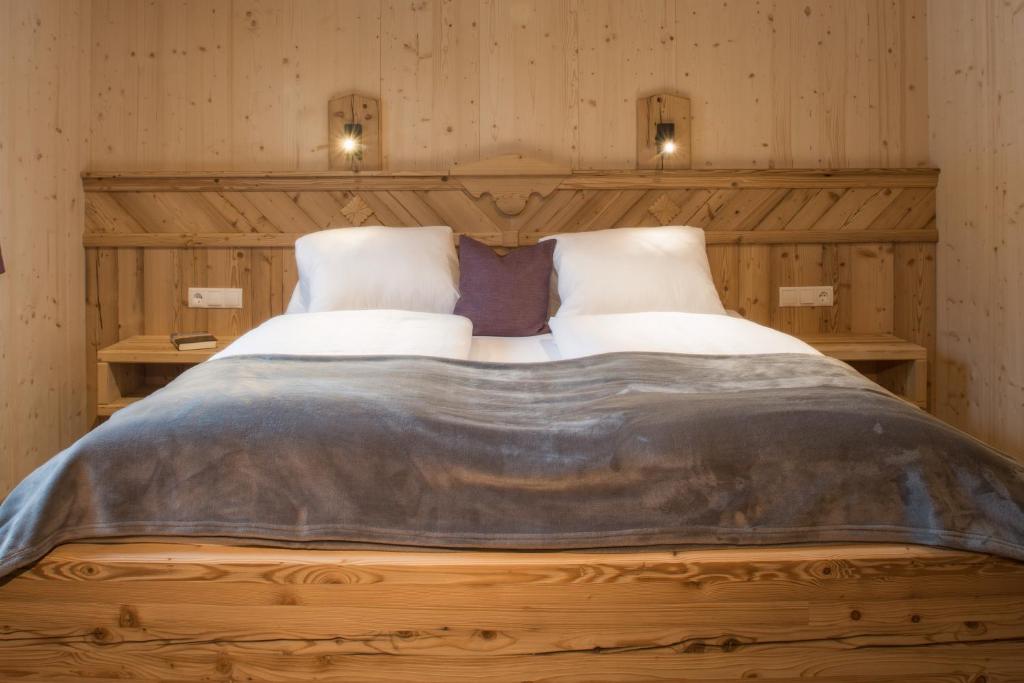 Postel nebo postele na pokoji v ubytování Alpenchalet Stadlpoint