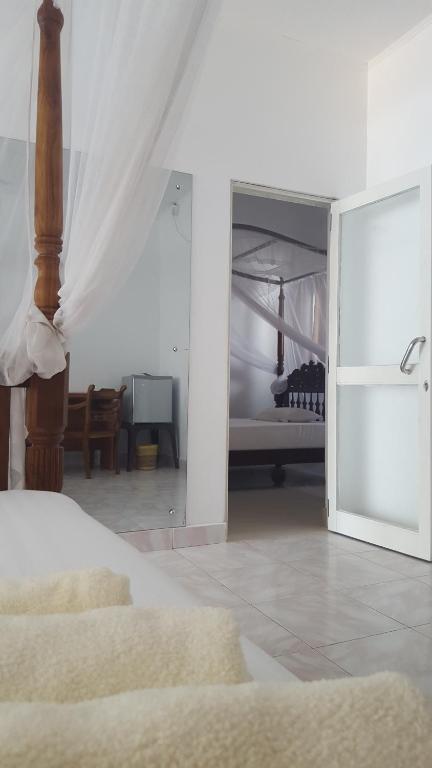 Postel nebo postele na pokoji v ubytování Edelweiss Resort