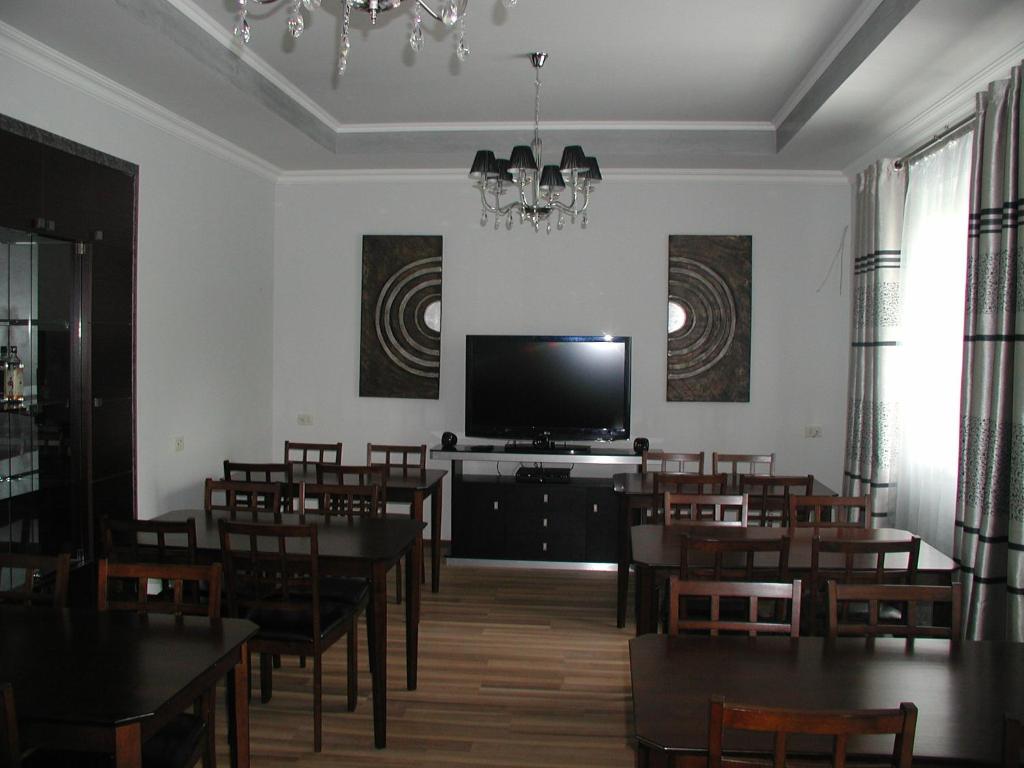 TV a/nebo společenská místnost v ubytování Hotel Grig
